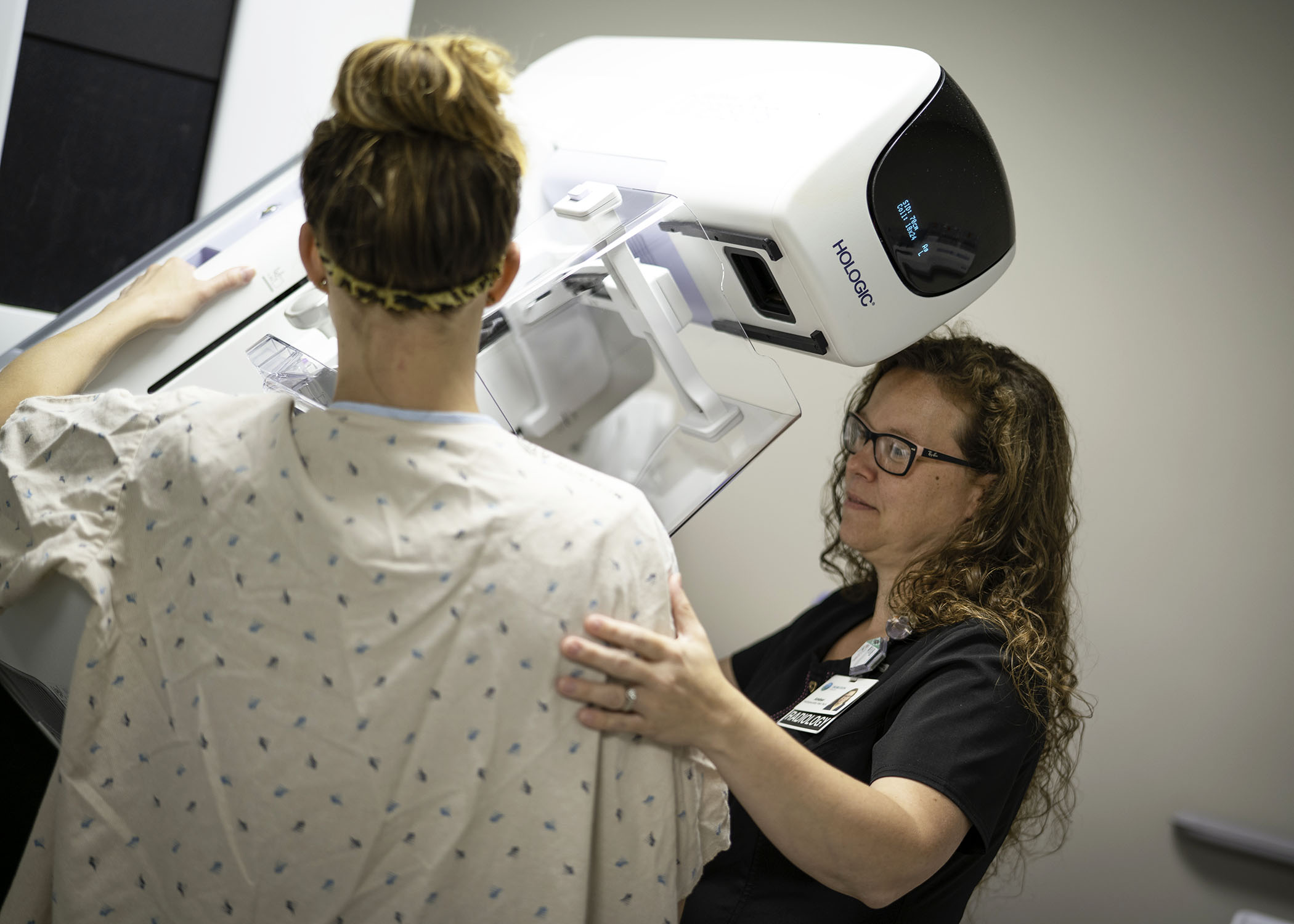 woman getting a mammogram