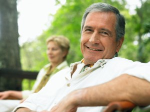 man and woman sitting outside