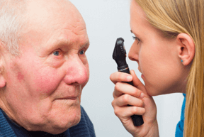 doctor examining patient eye