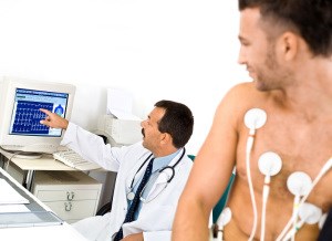 doctor doing arrhythmia test on a man